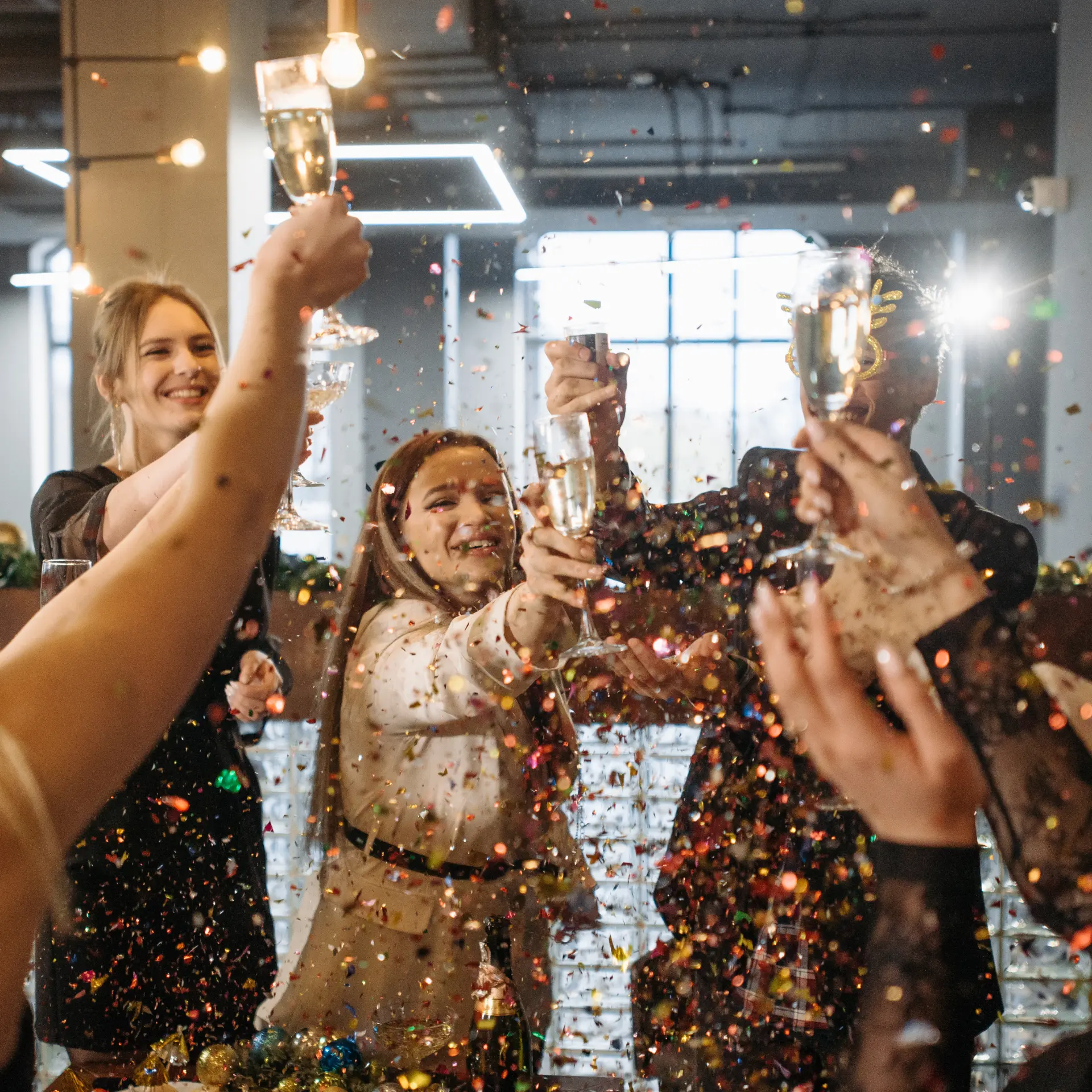 Colleagues celebrating at a festive office party